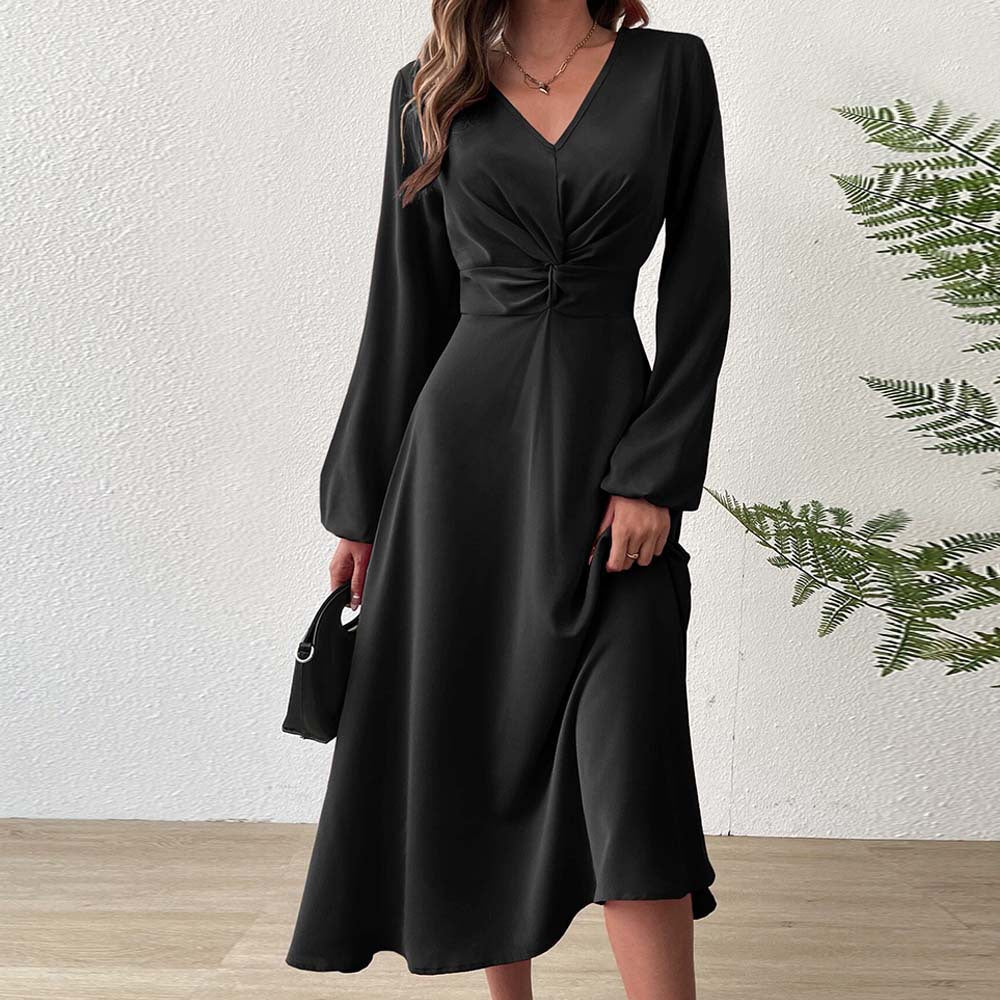 Woman wears French Adult Lady V Neck Midi Dress in deep green with high waist and A-line cut, styled for fall-winter with bold accessories.
