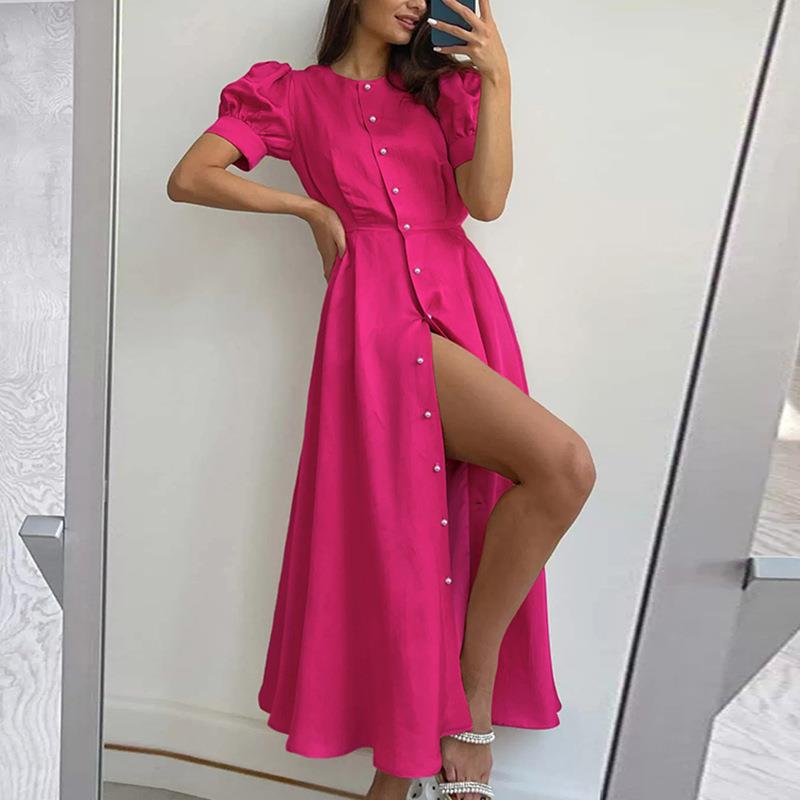 Woman in a high waist solid color maxi dress, radiating summer elegance and confidence, perfect for the modern office or day-to-night style transition.