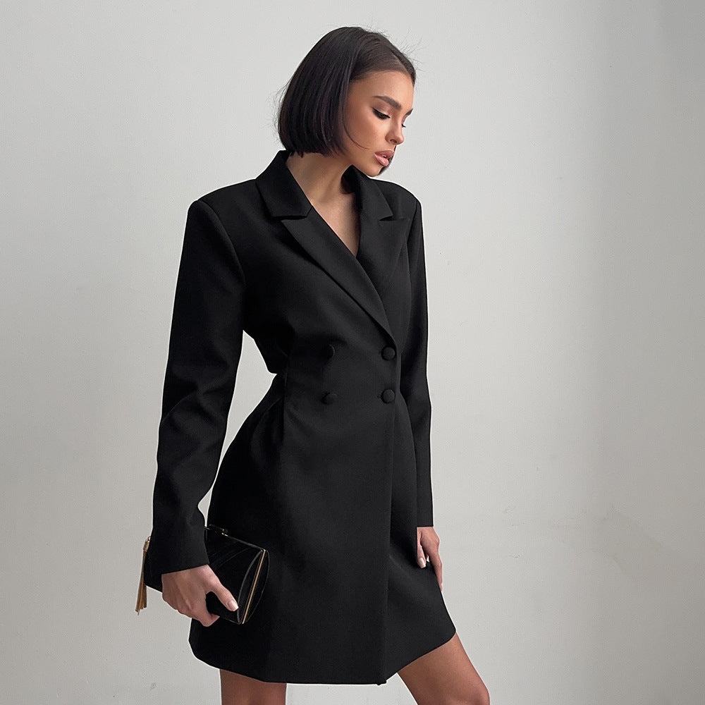 Confident woman wearing the Sweet Cool Business Dress by Re Vibe, featuring a sculpted silhouette and bold style, ready for spring-summer office and nightlife.