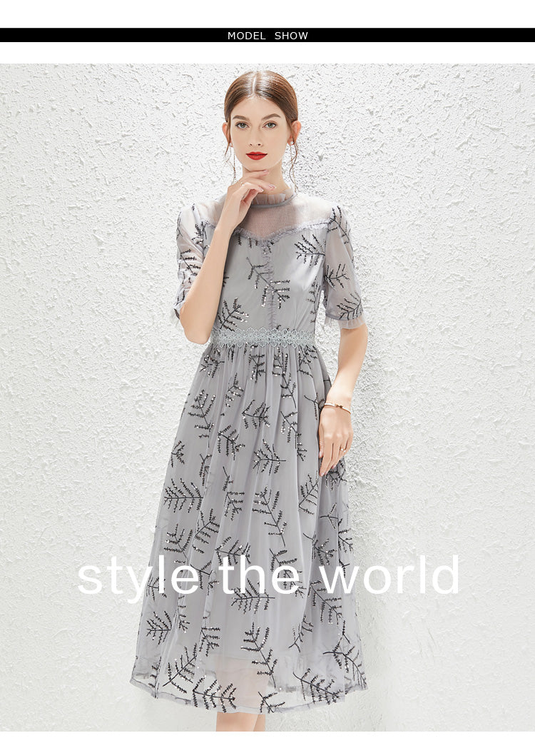 Nuevo vestido de gasa gris con lentejuelas, elegante y a la moda.