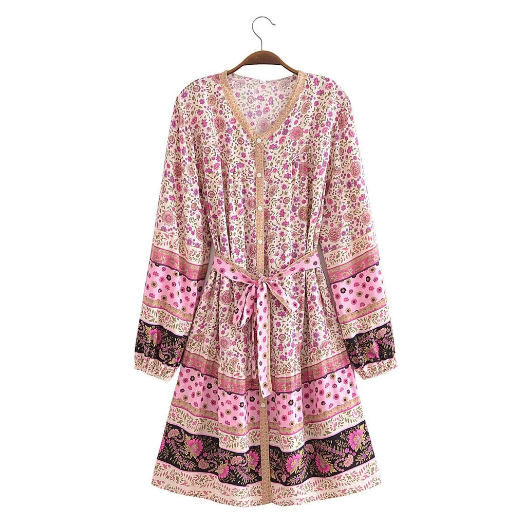 Robe ample mi-longue à taille haute et motif floral en filigrane