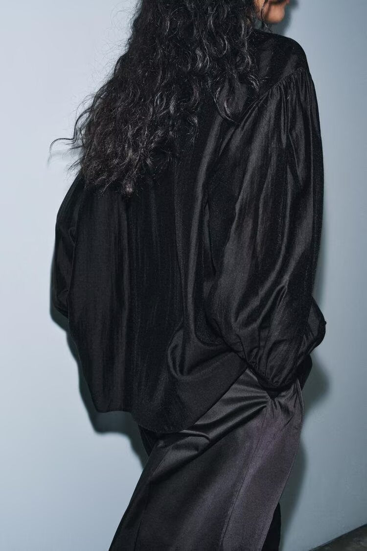 Chemise d'hiver pour femme, ample, avec nœud décoratif et drapé.