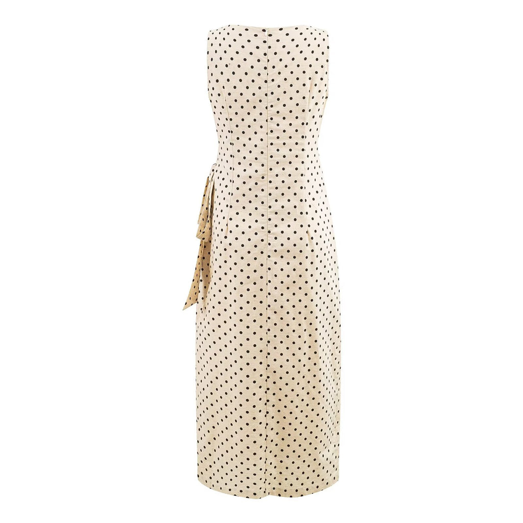 Robe maxi sans manches à pois, taille cintrée, lacée sur le côté, col rond et fente latérale, plissée et à taille plissée.
