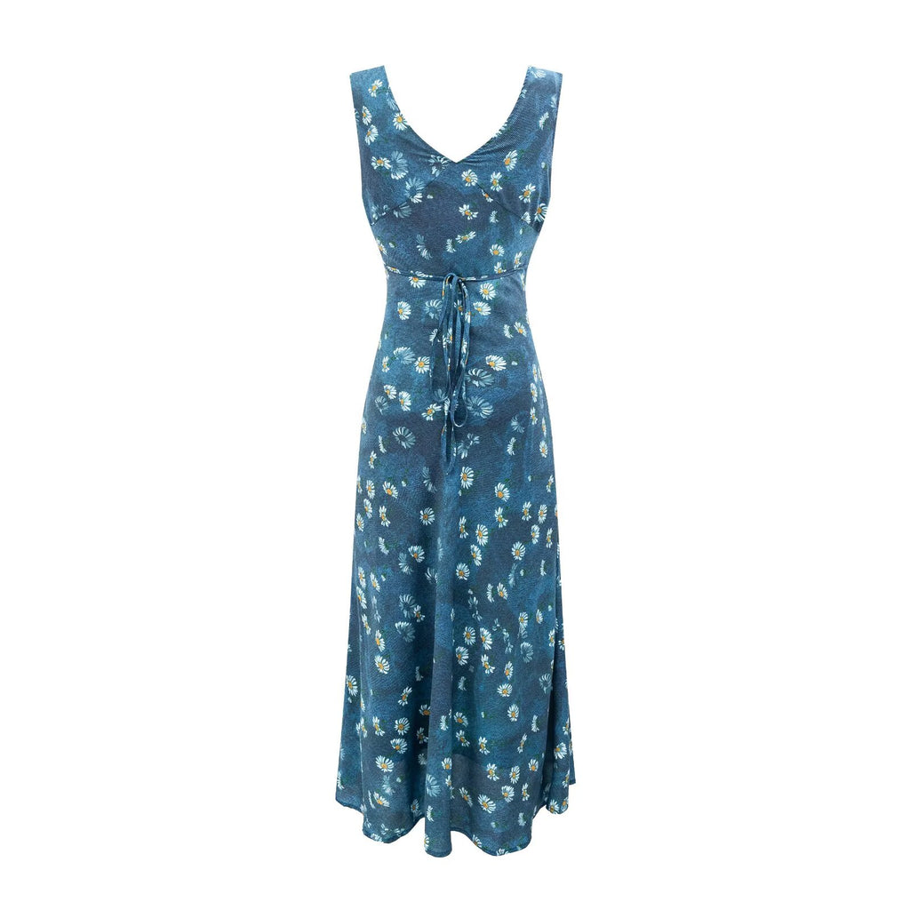 Vestido estampado retro de invierno sexy con cuello en V y cordones en la cintura ajustada con fondo azul.