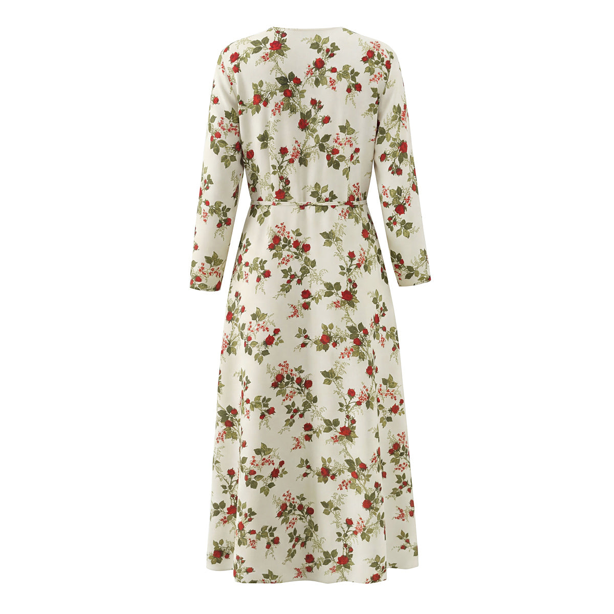 Vestido tipo manta con estampado floral idílico, cuello con lazo y cintura ajustada, mangas largas y bajo el vientre.