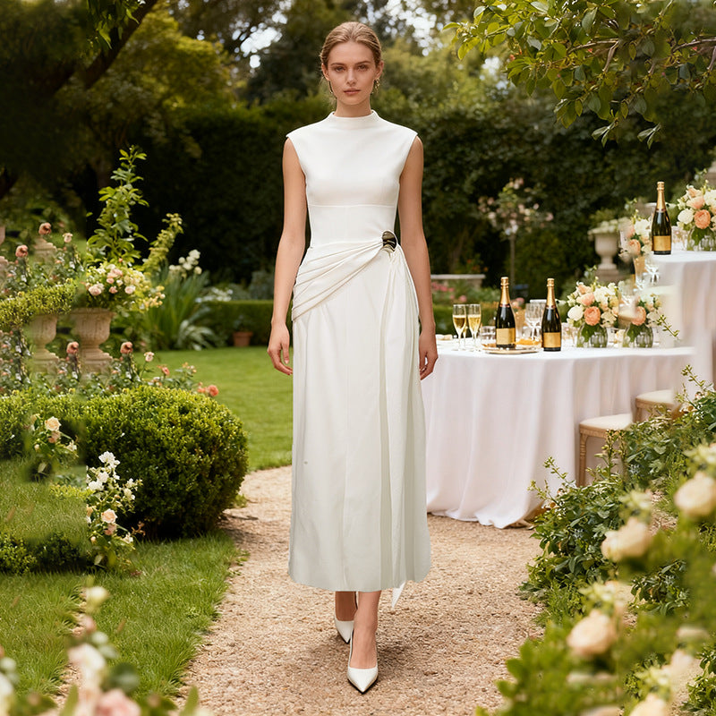 Autumn Arrival An Elegant Solid Color Sleeveless Dress With A Fitted Waist A Twisted Knot Detail At The Waist