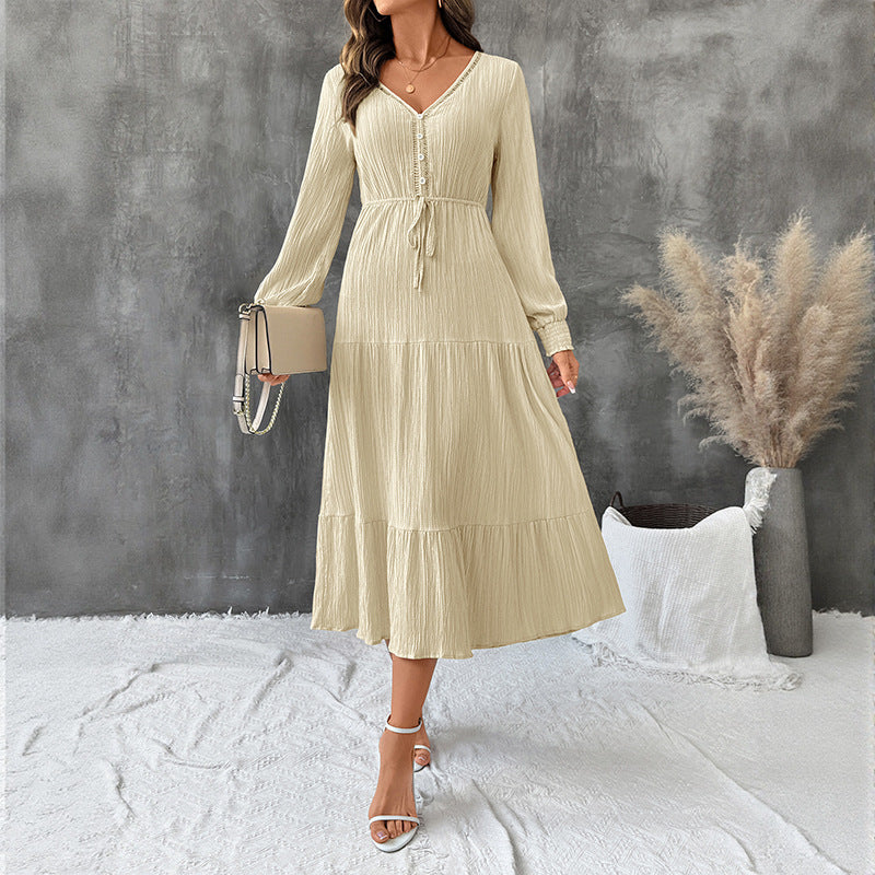 Robe d'automne élégante à manches longues plissées et col en V, couleur unie