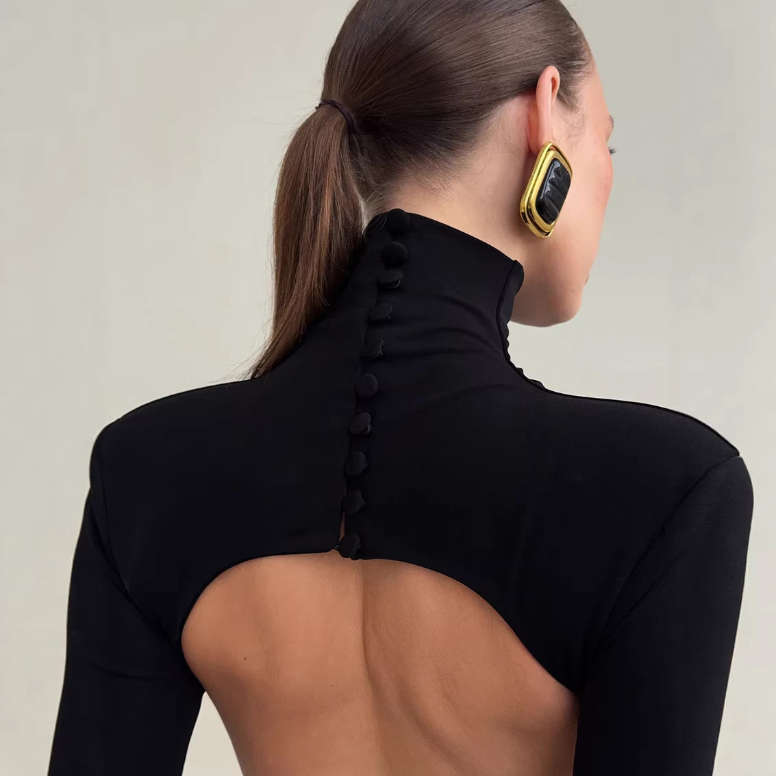 Vestido elegante de primavera negro sexy sin espalda de punto ajustado de manga larga con cuello alto para mujer