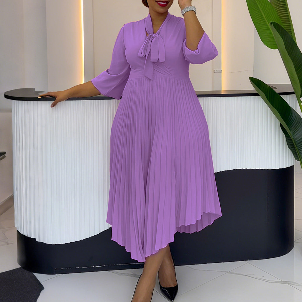 Robe asymétrique élégante à lacets et manches trois-quarts, plissée