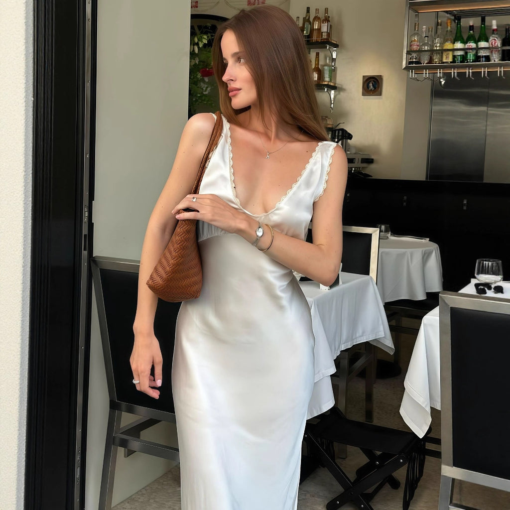 Robe d'été pour femme, style français, luxueuse, élégante et sans manches, cintrée.