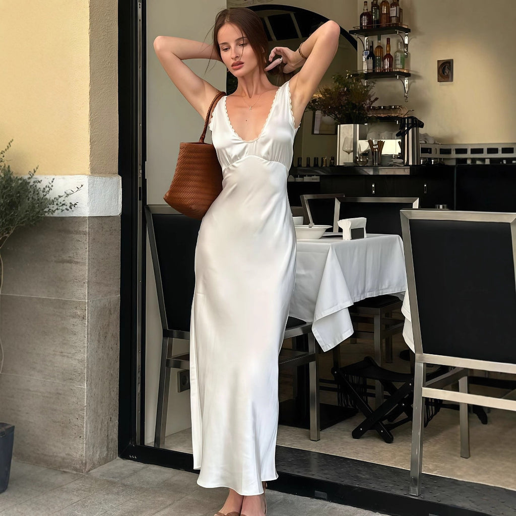 Robe d'été pour femme, style français, luxueuse, élégante et sans manches, cintrée.