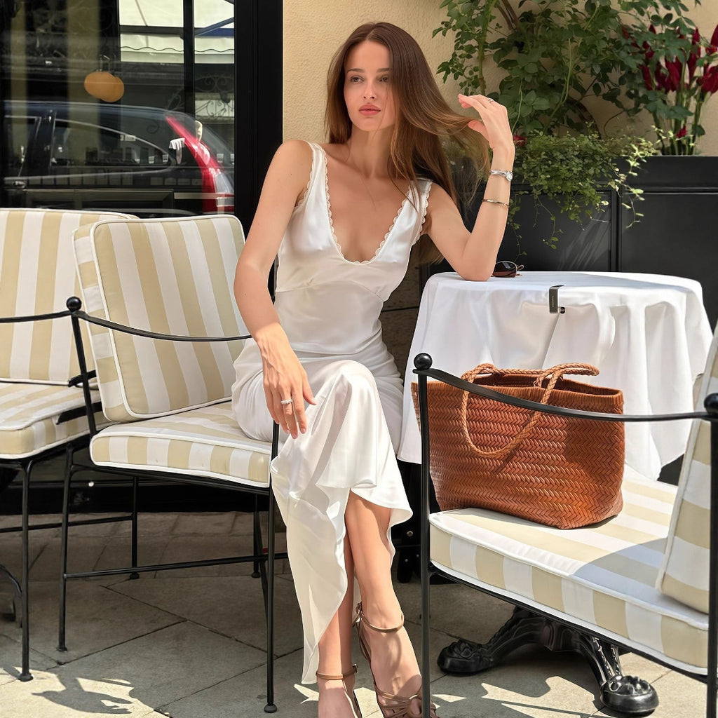 Robe d'été pour femme, style français, luxueuse, élégante et sans manches, cintrée.