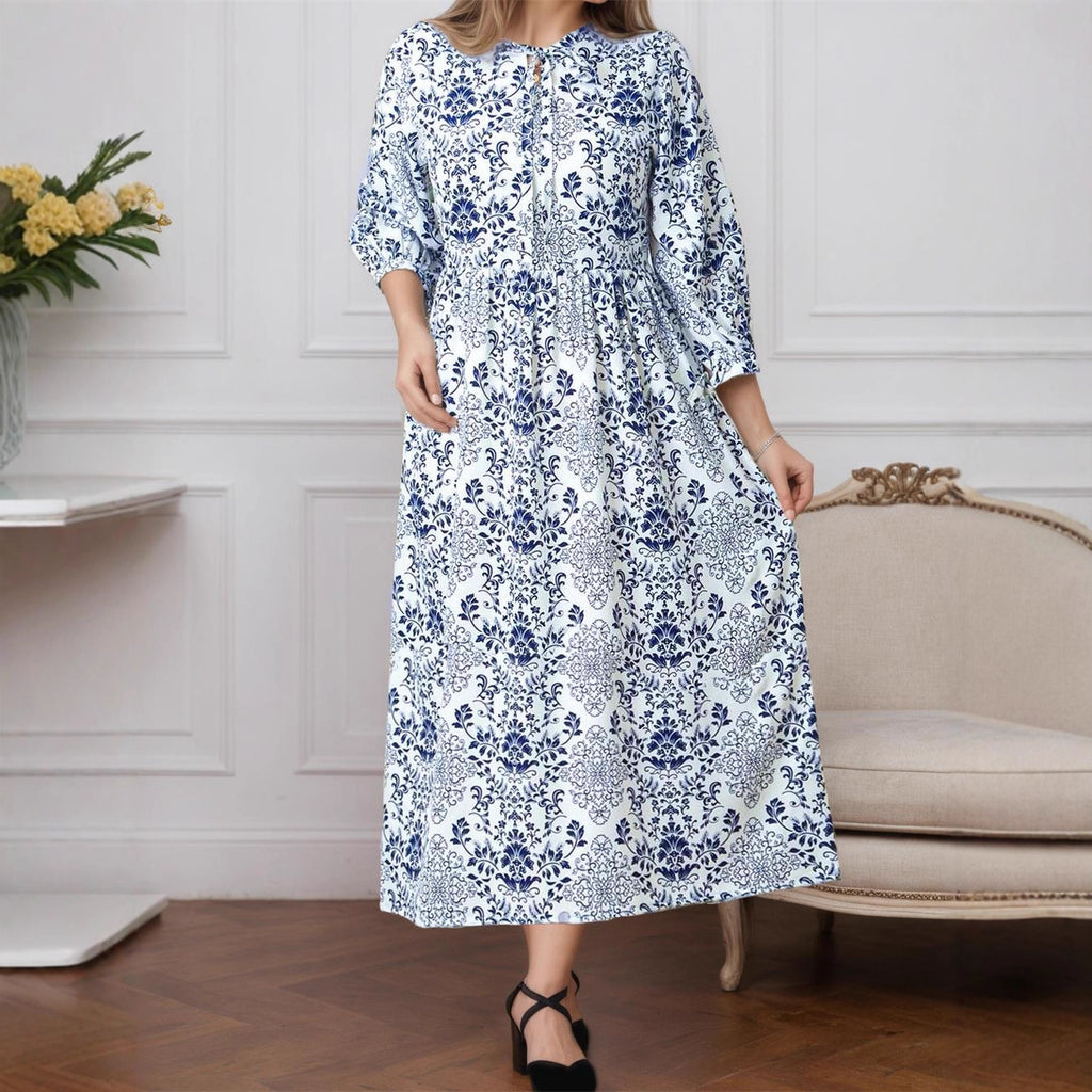 Robe élégante imprimée à lacets et manches longues, coupe trapèze, idéale pour l'automne et l'hiver.